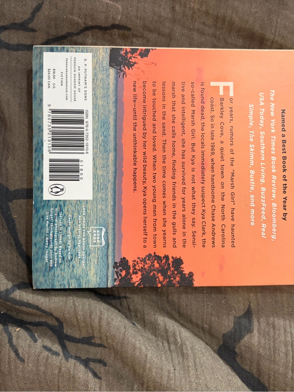 Paperback Novel — Orange Cover by (Unknown Brand)